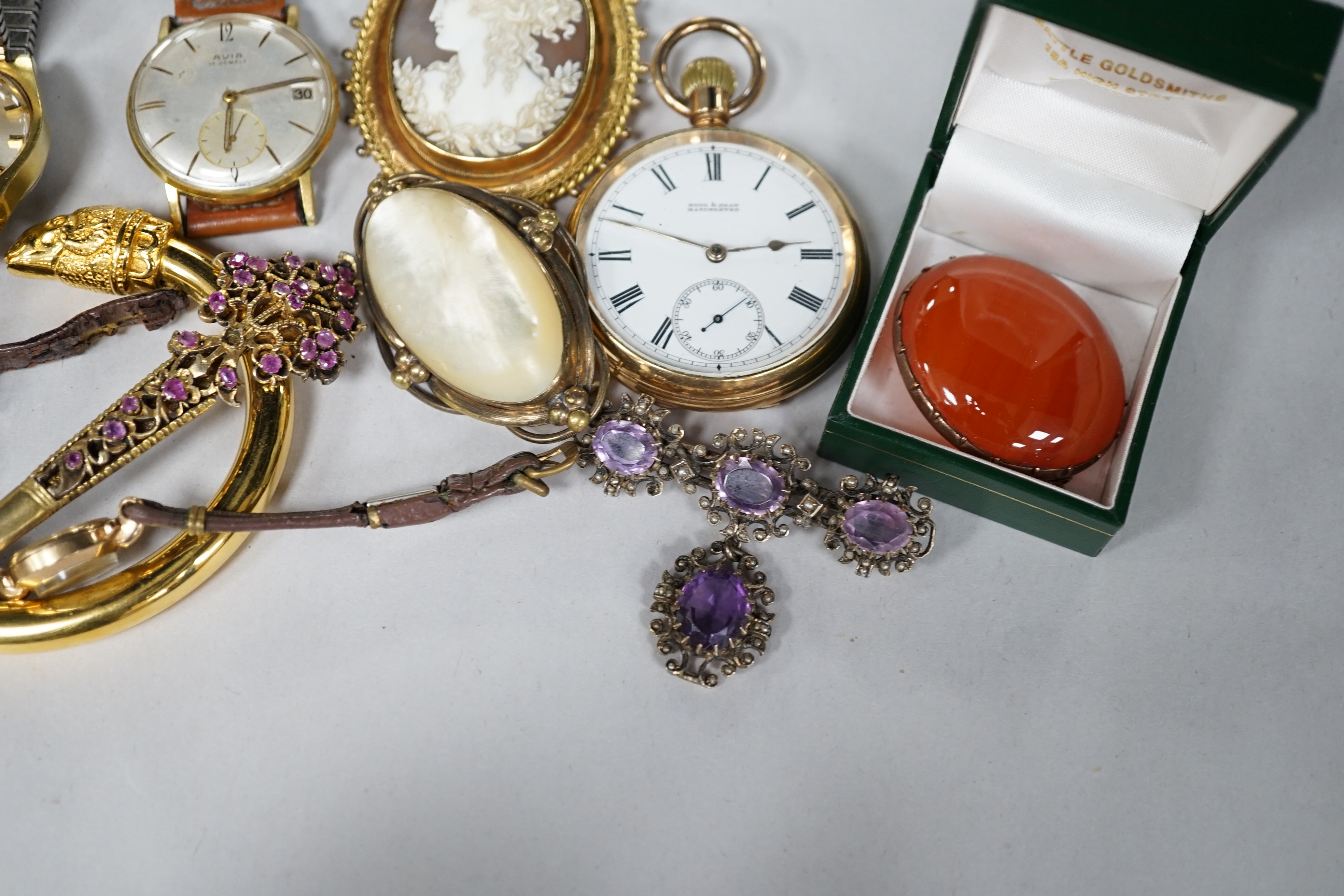 A yellow metal mounted oval cameo shell brooch, carved with the bust of a lady to dexter, with cannetille and rope twist border and other items including costume jewellery, a gold plated pocket watch, two gentleman's wri